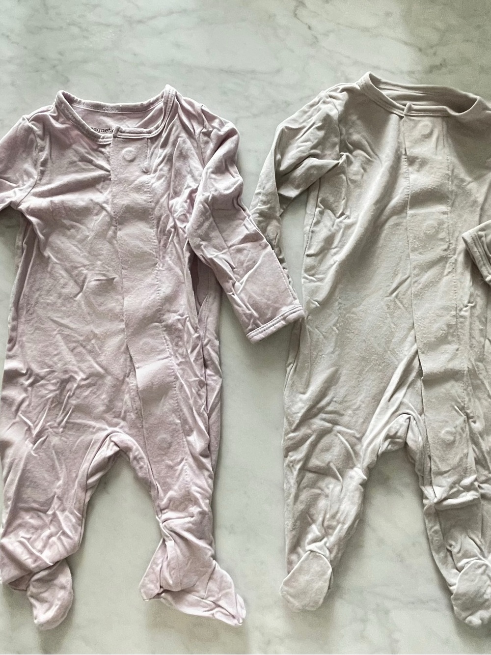 Magnetic Me Baby Footed One-Pieces in Pale lilac and silver